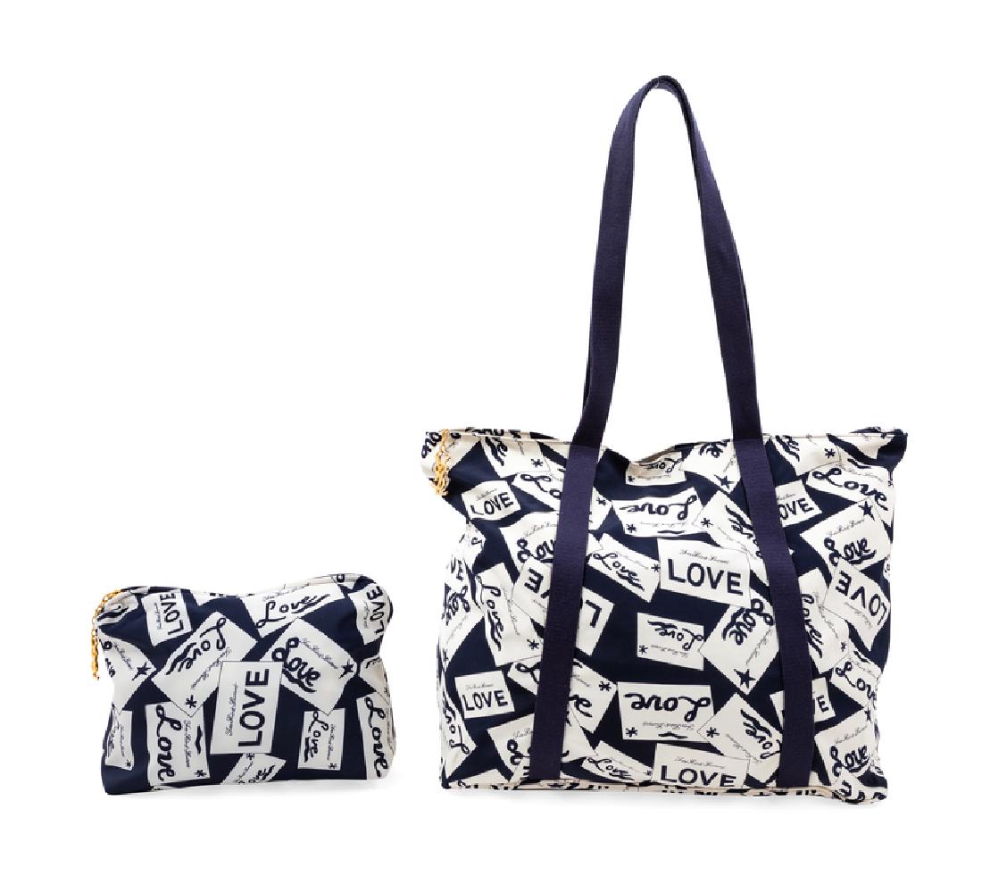 Yves Saint Laurent 'Love Notes' Travel Tote with: Yves Saint Laurent 'Love Notes' Travel Tote with Matching Makeup Bag, 1980-90s Navy and cream microfiber with goldtone hardware, black nylon interior with a large zip pocket, zip top with a chain YSL 