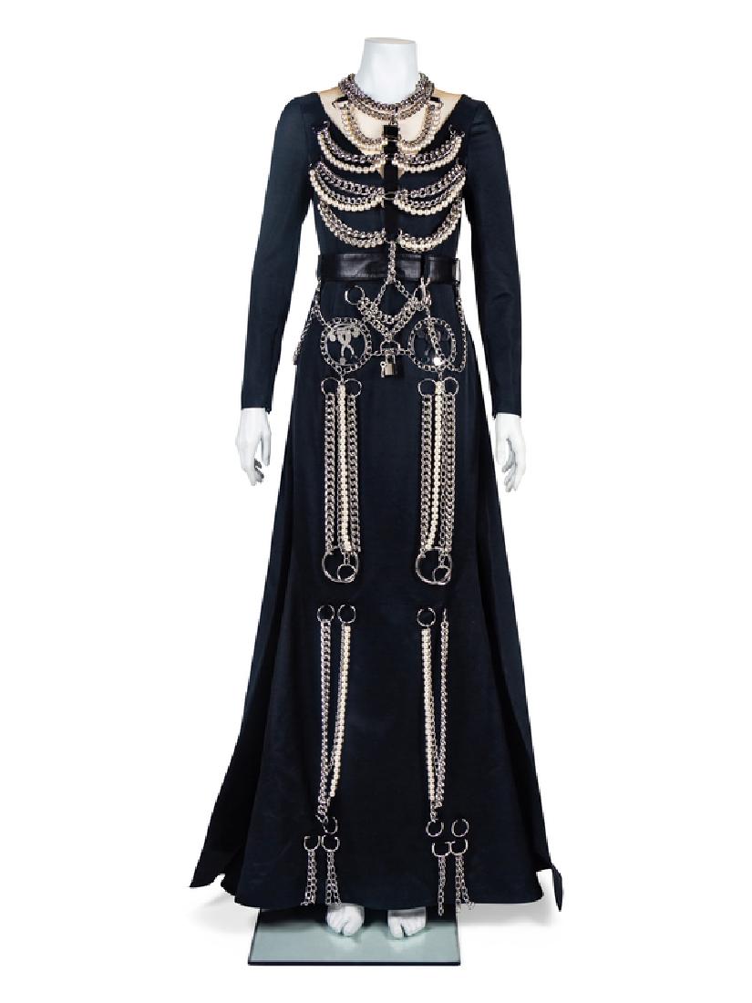 Moschino Black 'Skeleton' Dress, A/W 2016-17: Moschino Black 'Skeleton' Dress, A/W 2016-17 Black cotton-blend twill dress with a skeleton pattern created down the front of the dress with silvertone chains, strands of faux pearls and other metal p