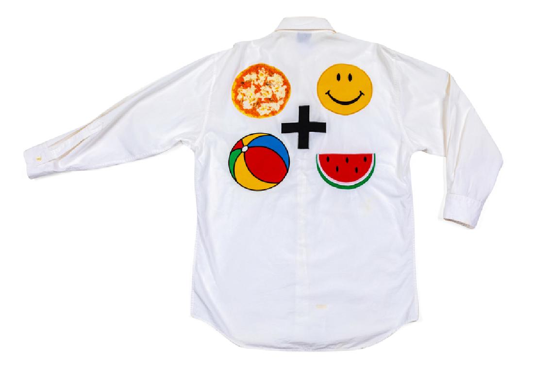 Moschino Icon Shirt, 1980-90s: Moschino Icon Shirt, 1980-90s White cotton dress shirt with prints and appliques on the back in shape of a pizza, smiley face, plus sign, beach ball and slice of watermelon. The center front button