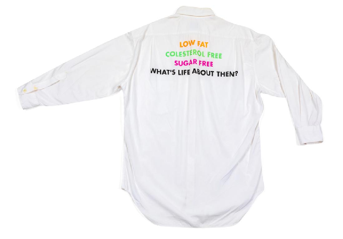 Moschino 'What's Life About Then?' Shirt, 1980-90s: Moschino 'What's Life About Then?' Shirt, 1980-90s White cotton dress shirt with a plain front and the following words printed in colorful letters on the back, 'Low Fat / Colesterol Free / Sugar Free