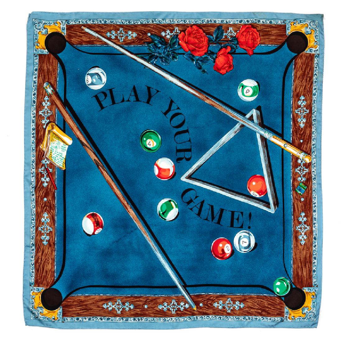 Moschino Scarf, 1990s: Moschino Scarf, 1990s Silk twill scarf printed with pool table scene and the words 'PLAY YOUR GAME'. Labelled within the print: Moschino Approximate size: 35" x 35" Condition: Overall good condition.