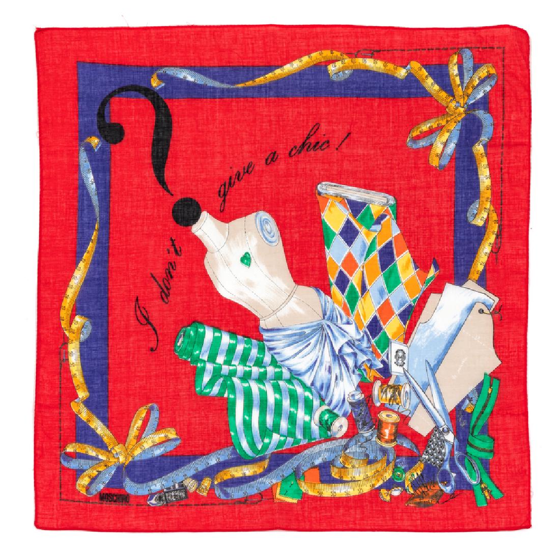 Moschino Handkerchief, 1980-90s: Moschino Handkerchief, 1980-90s Red cotton scarf printed with sewing scene with a variety of sewing equipment. Labelled within the print: Moschino Approximate size: 17" x 17" Condition: Overall excell