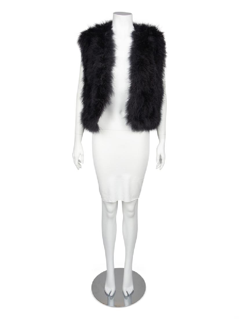 Adrienne Landau Vest, 1990-2000s: Adrienne Landau Vest, 1990-2000s Sleeveless black vest covered entirely with black ostrich feathers. Opening down center front, no closure and lined with black acetate. With original retail labels, bu