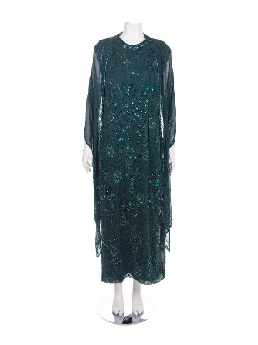 Two Richilene Dresses, 1980-90s: Two Richilene Dresses, 1980-90s The first: Green sheer crepe embroidered with sequins, beads and green thread in an all-over pattern. The long dress is sleeveless, with a scoop neckline and closes dow