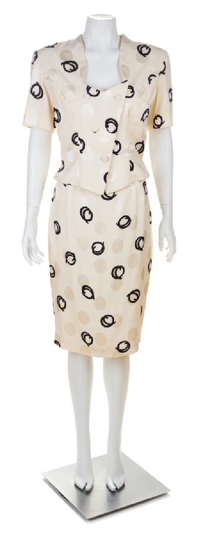 Vicky Tiel Skirt Ensemble, 1980-90s: Vicky Tiel Skirt Ensemble, 1980-90s Short sleeve double breasted jacket with a square neckline and a fitted silhouette; together with a matching pencil skirt with a side zip closure. Label: Vicky