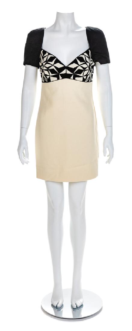 Atelier Versace Dress, A/W 1991: Atelier Versace Dress, A/W 1991 The main part of the dress is white ribbed wool with black wool cap sleeves and a black and white applique and embroidered bust. The white and black silk lining are sew