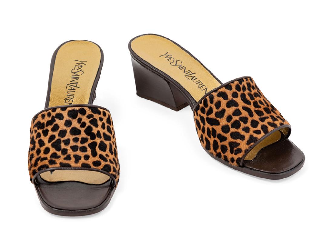 Yves Saint Laurent Mules, 1990-2000s: Yves Saint Laurent Mules, 1990-2000s Animal print calf leather mule with brown leather heel and toe. Stamped: Yves Saint Laurent Condition: Condition: Overall pristine condition. Unworn. Stamped Size: