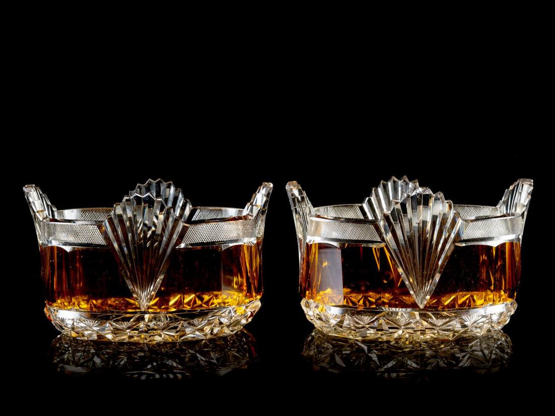 A Pair of English Cut Glass Wine Coasters Wid: A Pair of English Cut Glass Wine Coasters Width 7 1/4 inches.