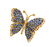 An 18 Karat Yellow Gold, Diamond, Sapphire and Emerald