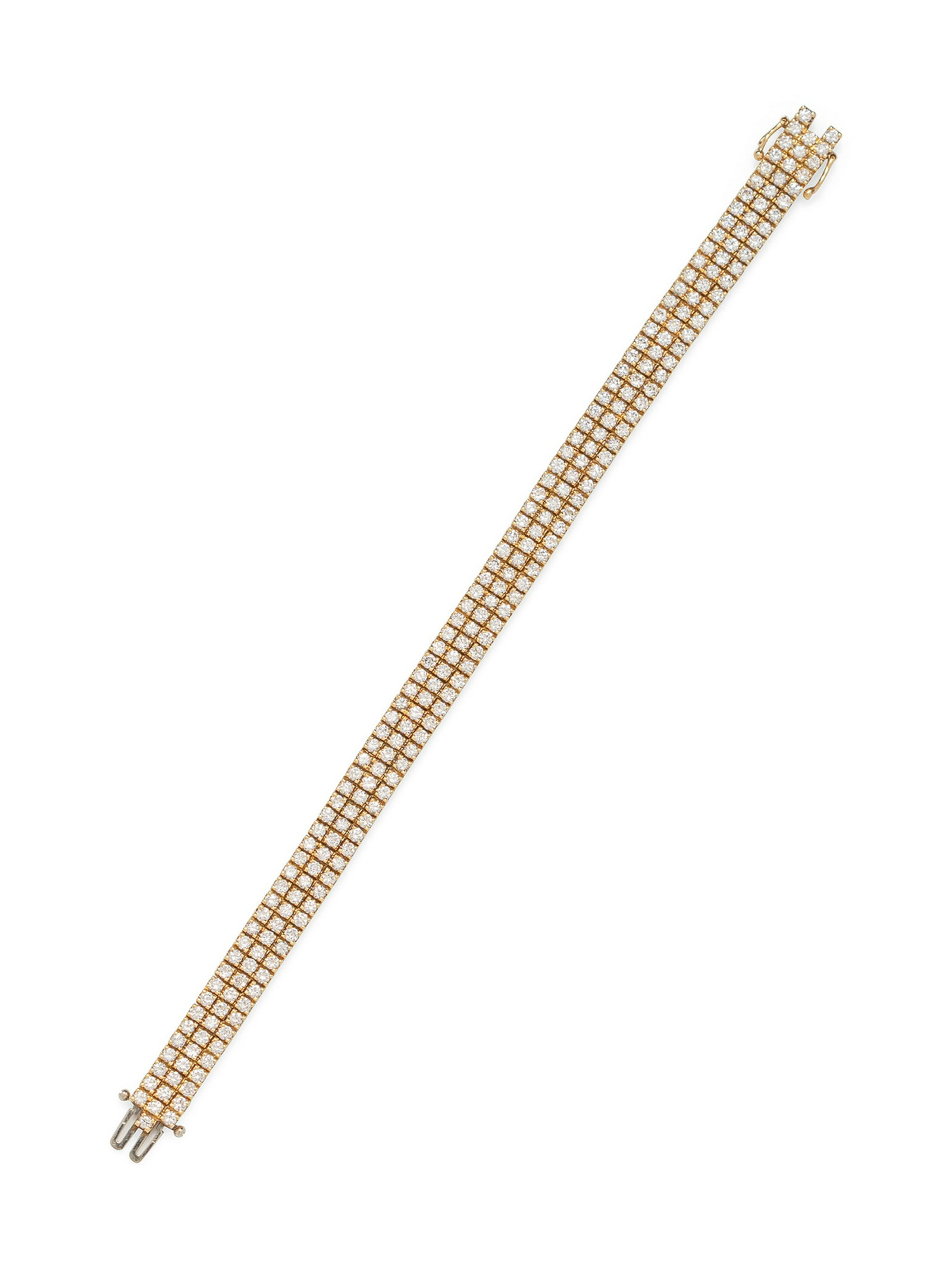An 18 Karat Yellow Gold and Diamond Bracelet,: An 18 Karat Yellow Gold and Diamond Bracelet, containing numerous round brilliant cut diamonds weighing approximately 6.40 carats total. Stamp: 18KP. 20.00 dwts. Property from the Estate of Herbert Wi