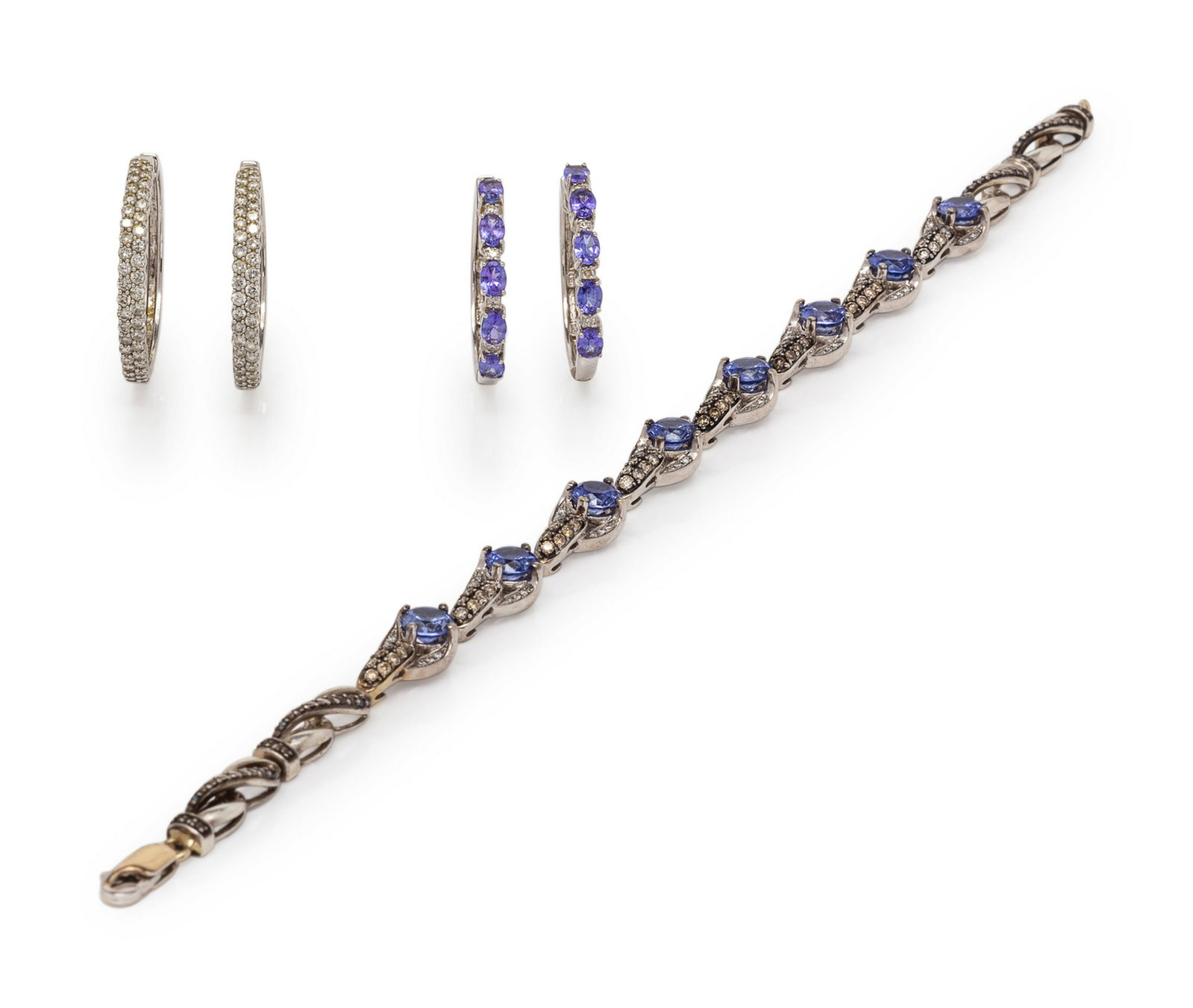 A Collection of White Gold and Diamond Jewelry,: A Collection of White Gold and Diamond Jewelry, consisting of a bracelet containing eight round tanzanites and 124 round brilliant cut diamonds, colored diamonds (origin of color not tested) weighing 