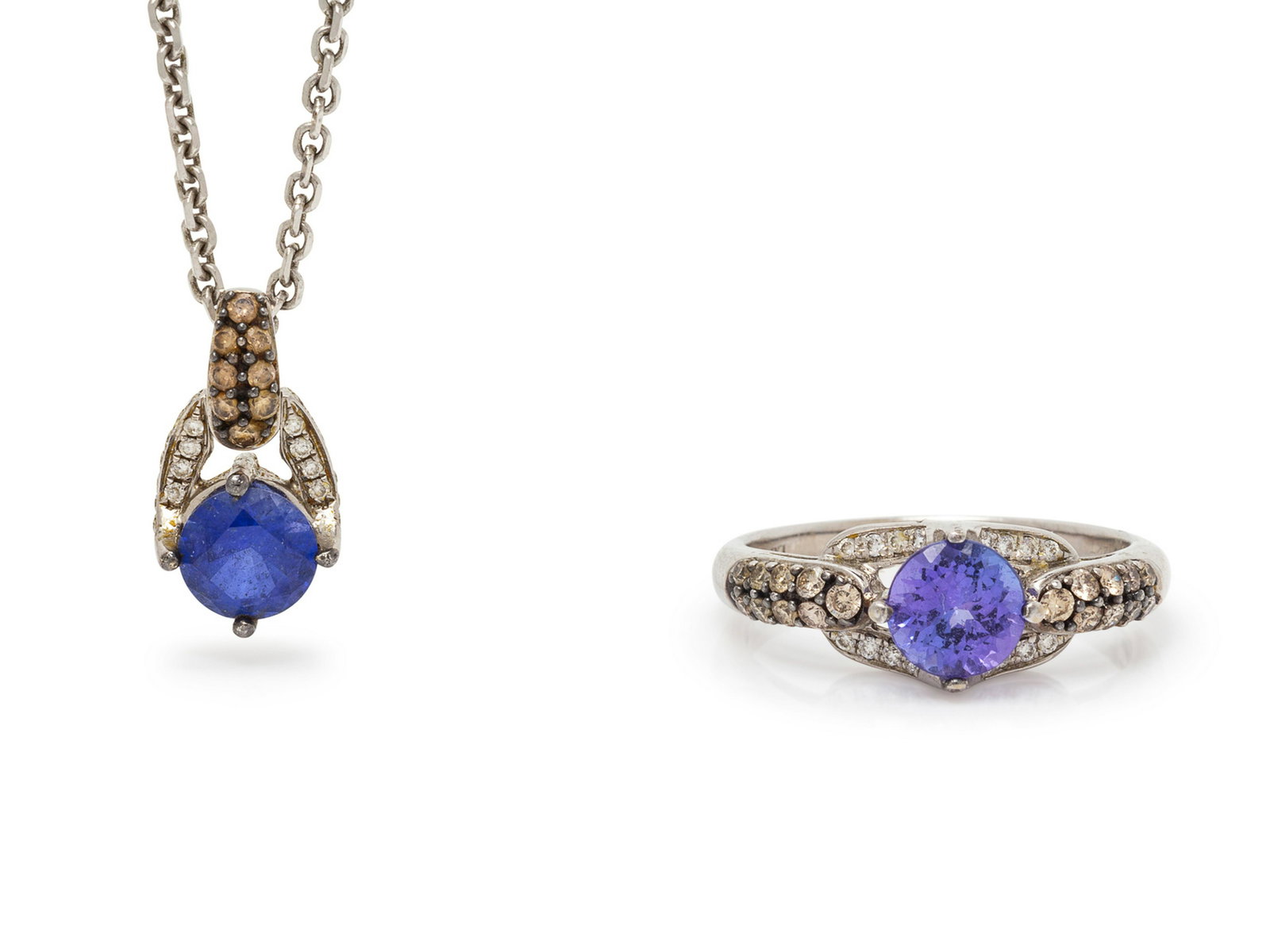 A Collection of 14 Karat White Gold, Tanzanite, Diamond: A Collection of 14 Karat White Gold, Tanzanite, Diamond and Colored Diamond Jewelry, LeVian, consisting of a ring containing one round mixed cut tanzanite and 34 round brilliant cut diamonds and color