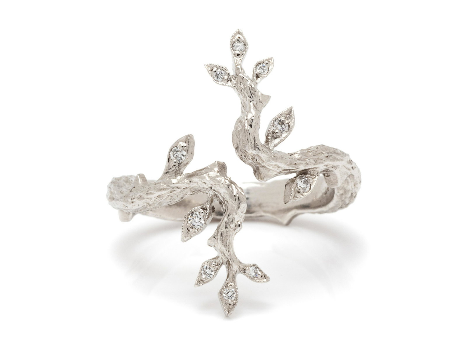 A Platinum and Diamond 'Branch' Ring, Cathy Waterman,: A Platinum and Diamond 'Branch' Ring, Cathy Waterman, designed as a naturalistic branch with leaves containing 10 round brilliant cut diamonds weighing approximately 0.06 carat total. Stamp: (maker's 