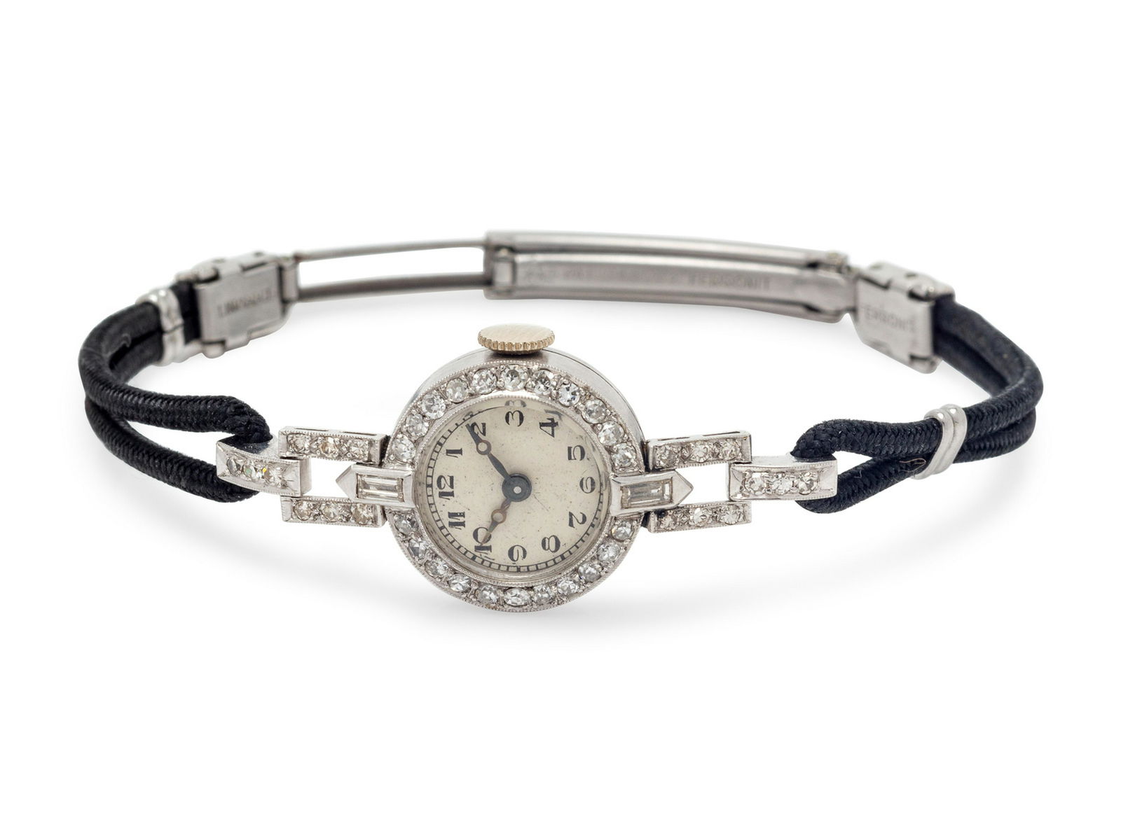 A Platinum and Diamond Wristwatch,: A Platinum and Diamond Wristwatch, 16.00 mm case diameter, white dial, black Arabic numerals, blued steel Breguet hands, the bezel and lugs containing 40 single cut diamonds weighing approximately 0.3