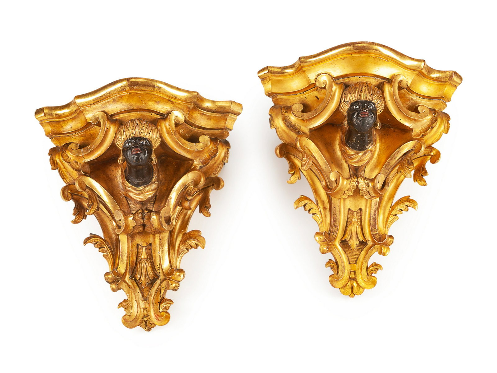 A Pair of Italian Painted and Giltwood Brackets: A Pair of Italian Painted and Giltwood Brackets 19th Century Height 15 x width 11 x depth 11 inches.