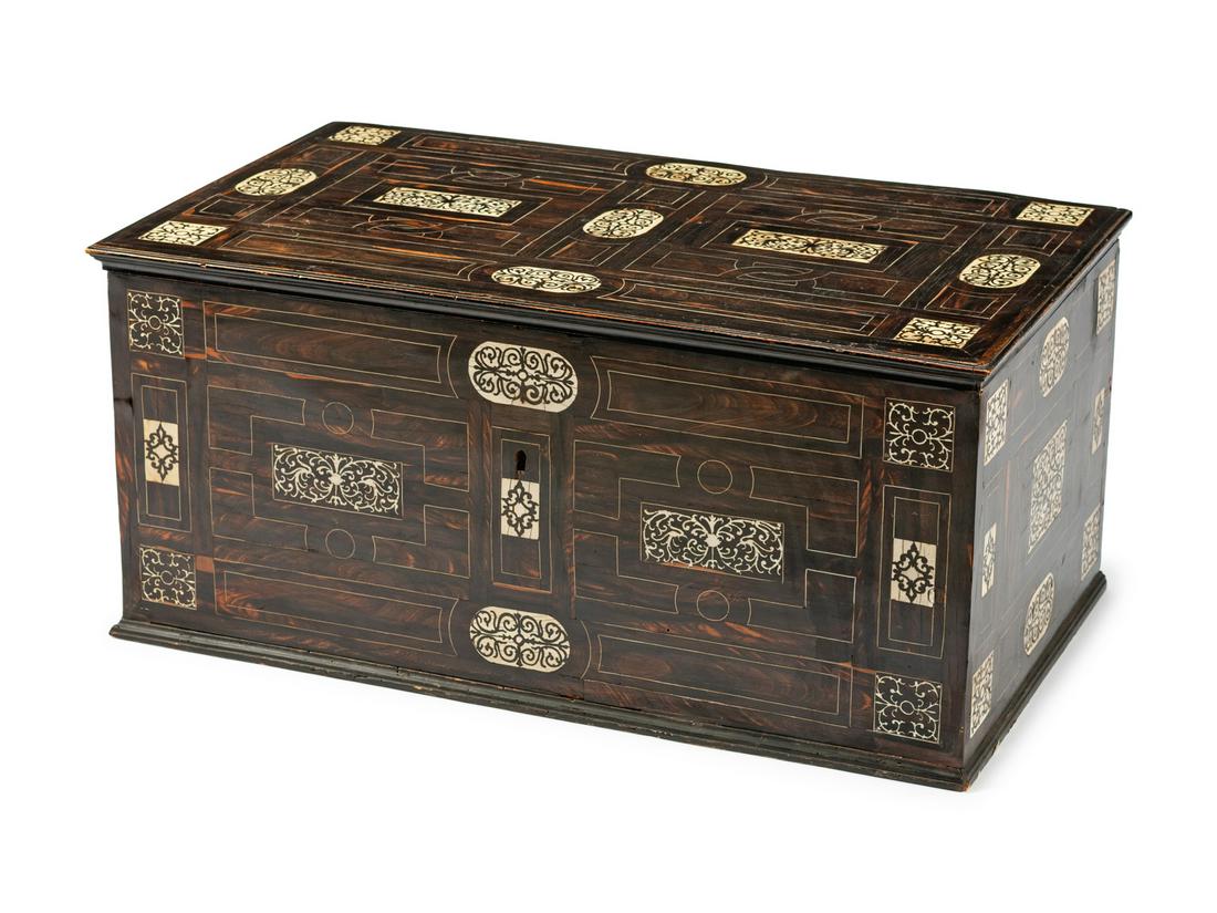 An Italian Inlaid and Ebonized Coffer: An Italian Inlaid and Ebonized Coffer 19th Century Height 15 1/2 x length 34 1/2 x depth 20 inches.