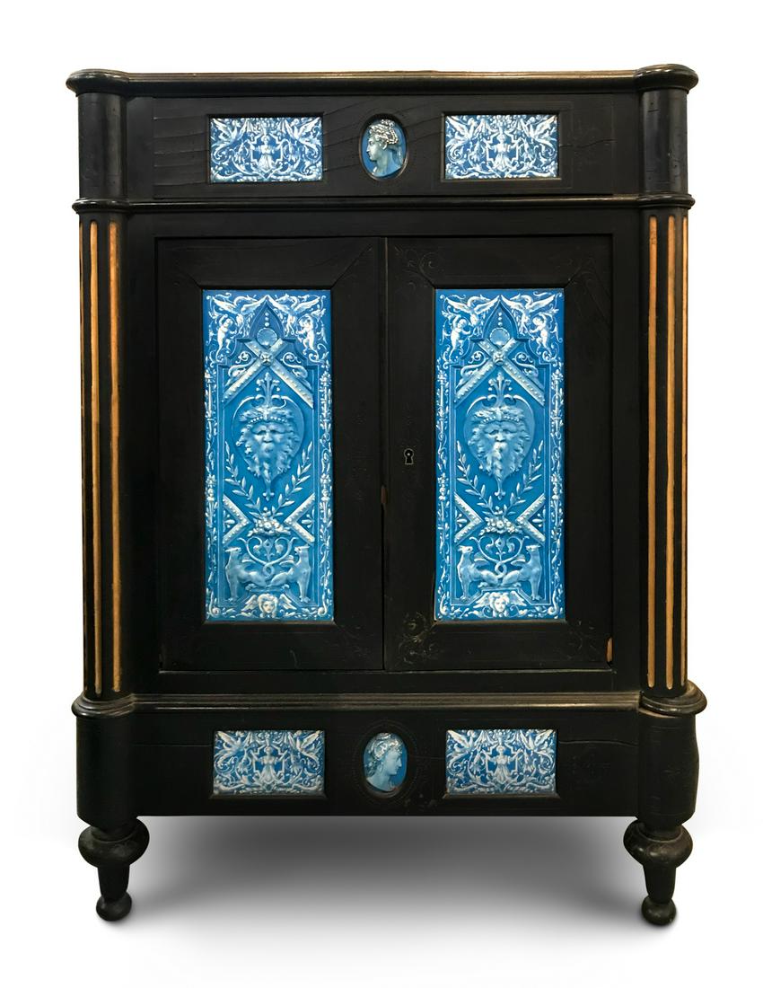 A Continental Blue Faience-Mounted Ebonized Cabinet (1 of 1)