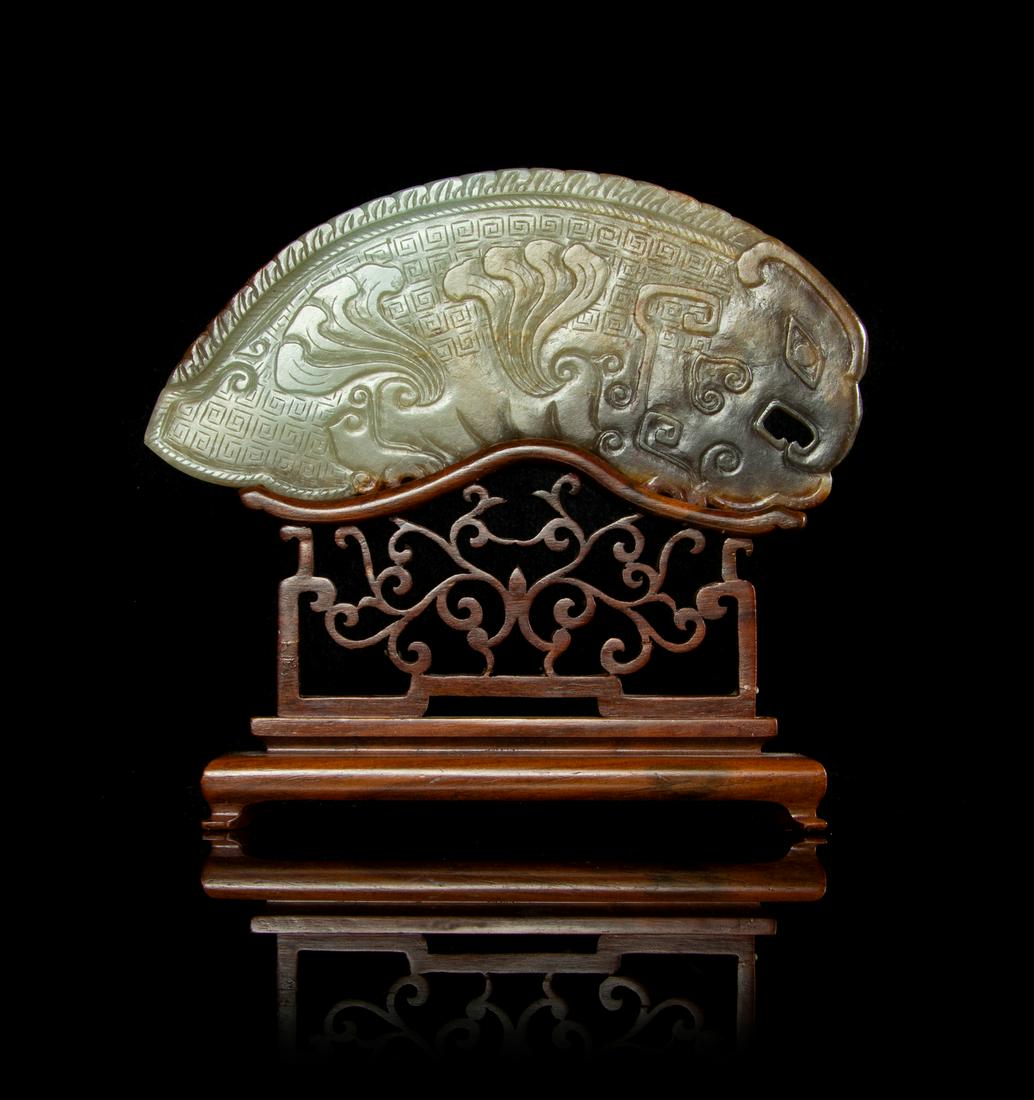 A Large Russet and Celadon Jade Phoenix-Form Plaque (1 of 1)