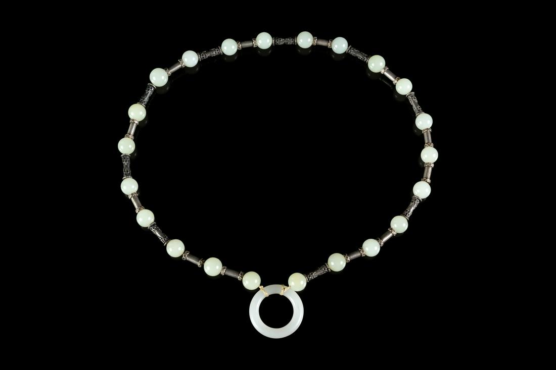 A White Jade and Silver Necklace Length 12 in., 30 cm. (1 of 1)