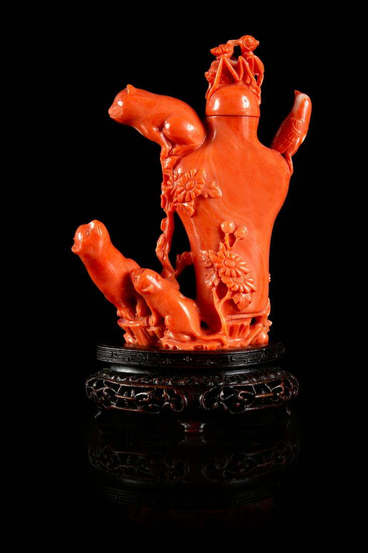 A Carved Red Coral Snuff Bottle Height 3 1/4 in., 8 cm. (1 of 1)