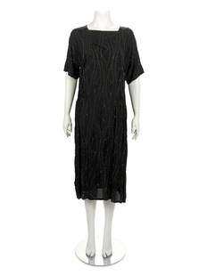 House of Adair Dress, 1920s: House of Adair Dress, 1920s Sold to benefit the Art Acquisition Fund at the Indianapolis Museum of Art at Newfield. Black silk dress with scoop neckline, long sleeves, loose fit throughout the body an