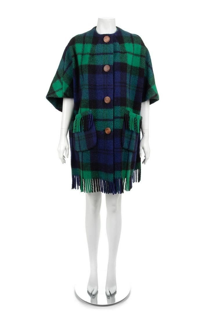 Merrywear Coat, 1960s: Merrywear Coat, 1960s Woolen cape coat with oversized wooden buttons, front button closure, front patch pockets, and fringed trim on pockets and hem. Label: Merrywear / Ennis Co. Clare / Tailored in R
