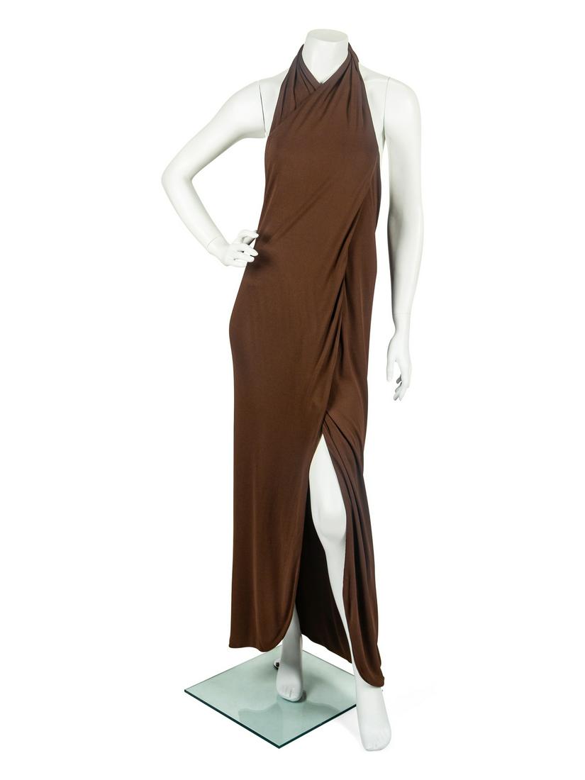 Halston Dress, 1970s: Halston Dress, 1970s Brown, long, backless, halter dress with left center front slit. Self tie at back neck with hook and eye closure. Fully lined with self material. Label: Halston No Size Label