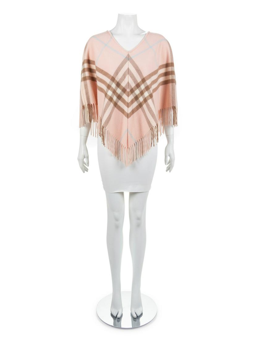 Burberry Cashmere Poncho, 2000s: Burberry Cashmere Poncho, 2000s Wool and cashmere poncho, in signature Burberry check in pale pink, pale blue, tan, and off-white, v-neckline, and fringed pointed hem. Label: Burberry London. 90% Meri