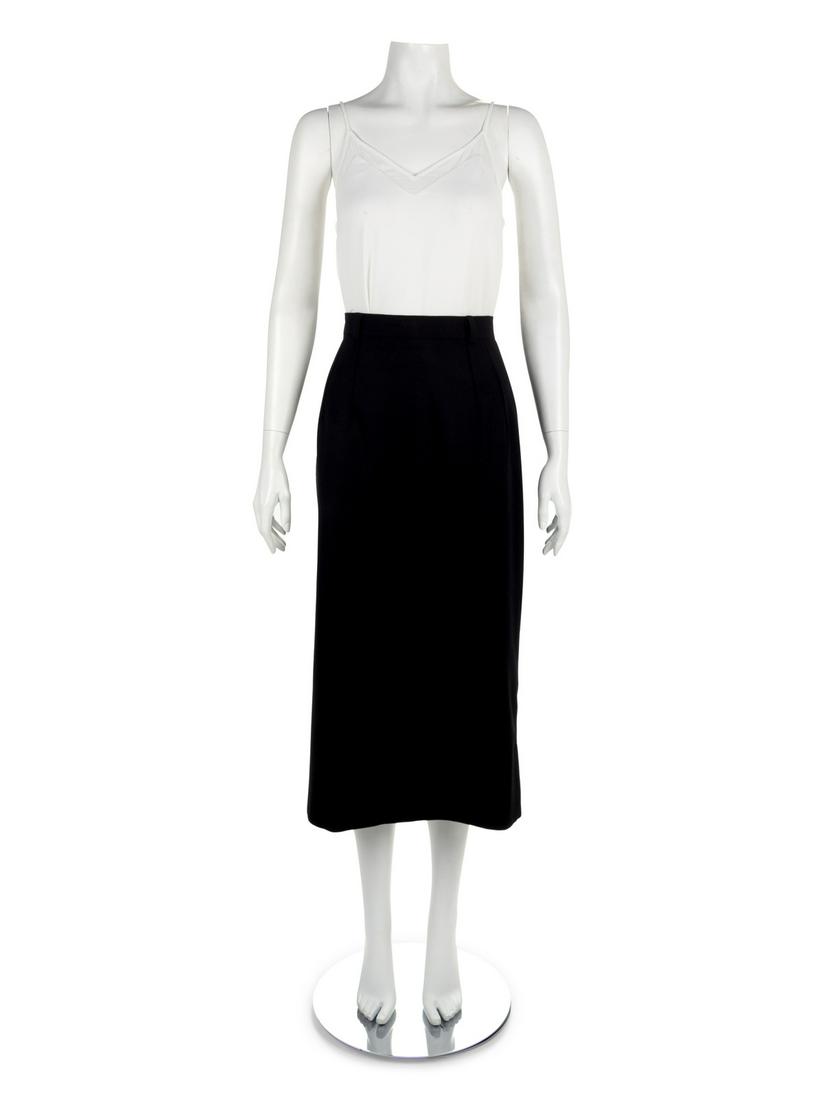 Three Oxford Clothes Skirts, 1980-2000s: Three Oxford Clothes Skirts, 1980-2000s All three skirts are made from the overall same pattern with a straight skirts with darts into the waistband, which closes at the center back with a zip. All sk