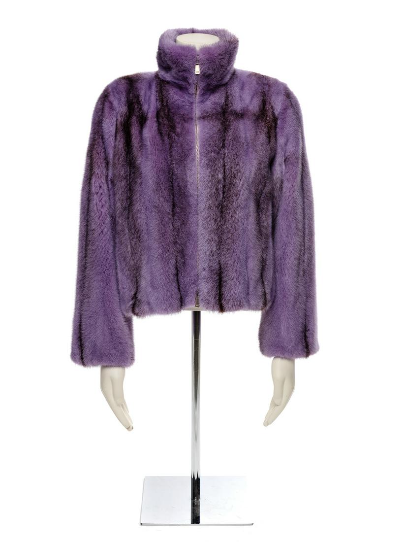 A Lavender Mink Jacket,: Lavender mink jacket with stand collar, straight fit sleeves, front pockets, and front zip closure. Interior is lined in lavender satin and has an interior pocket on front right side by opening. Label
