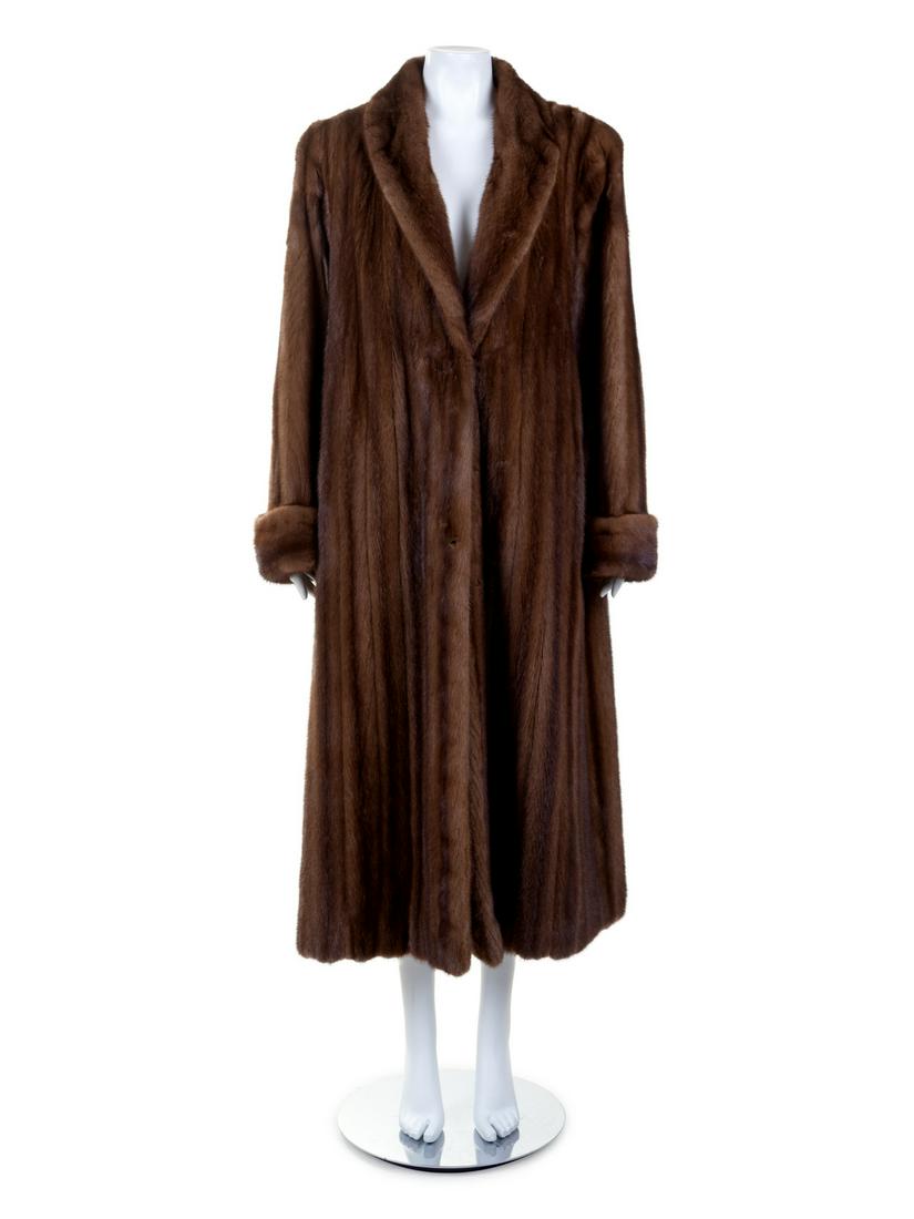 Yudofsky Mink Coat, 1980-1990s: Yudofsky Mink Coat, 1980-1990s Full length brown mink coat with three hook center front closure. Label: Yudofsky Approximate Flat Measurements:Bust: 24"Shoulder: 18"Sleeve: 26"Waist: 26"Hips: 27"Le