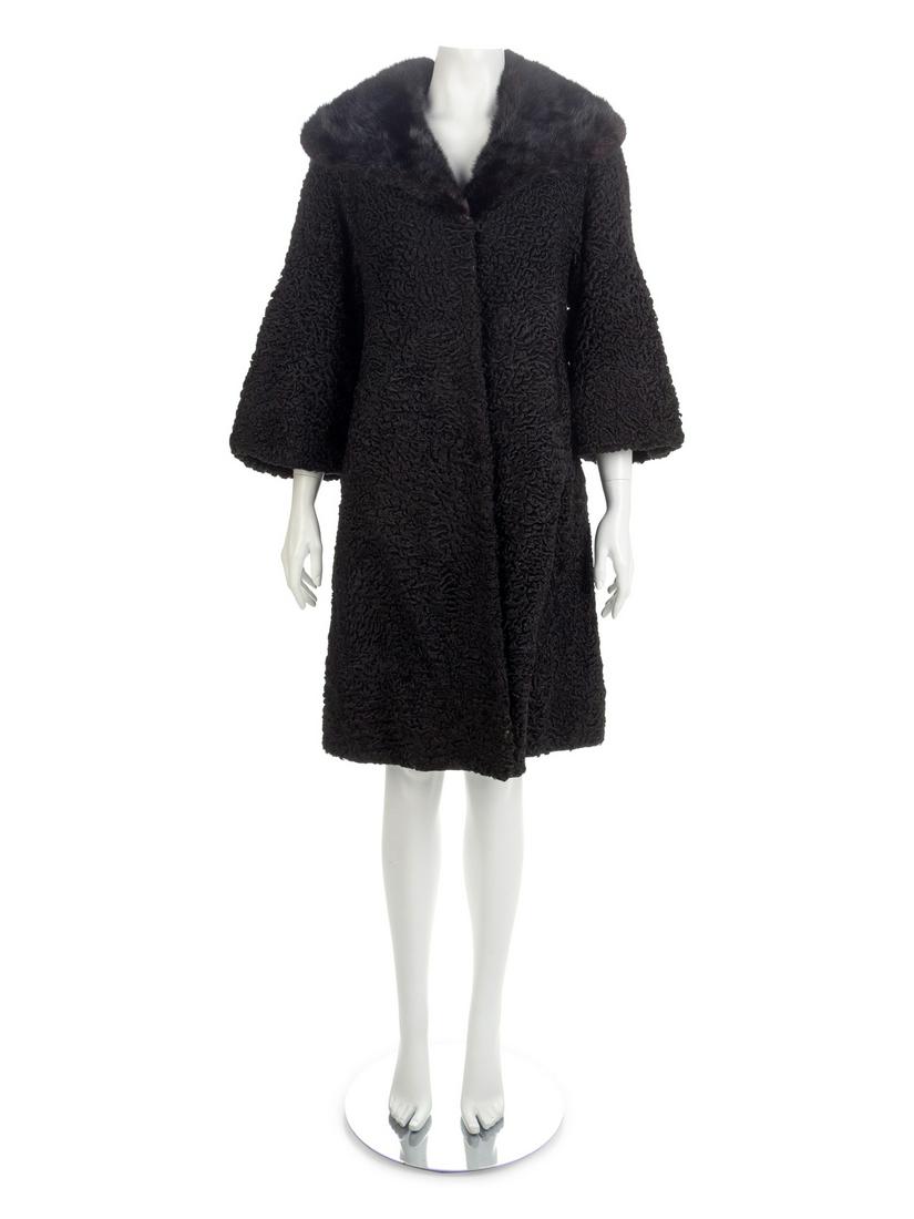 Evans Persian Lamb with Mink Coat, 1950-70s : Evans Persian Lamb with Mink Coat, 1950-70s Black lambswool coat with mink collar, center front top button closure with hooks and snaps and 3/4-length flared sleeves. A slip pocket over each hip.