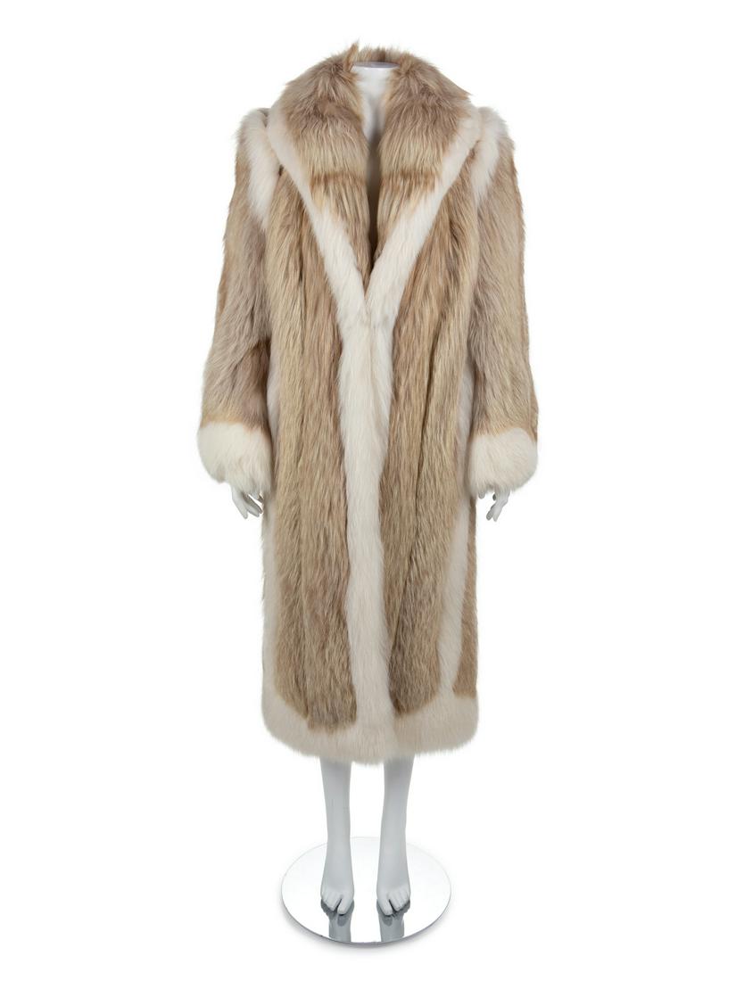 Fox Fur Coat, 1980-90s: Fox Fur Coat, 1980-90s Tan and white oversized fox fur coat trimmed with white fur with a large fold down collar, long sleeves and a center front opening. Provenance: