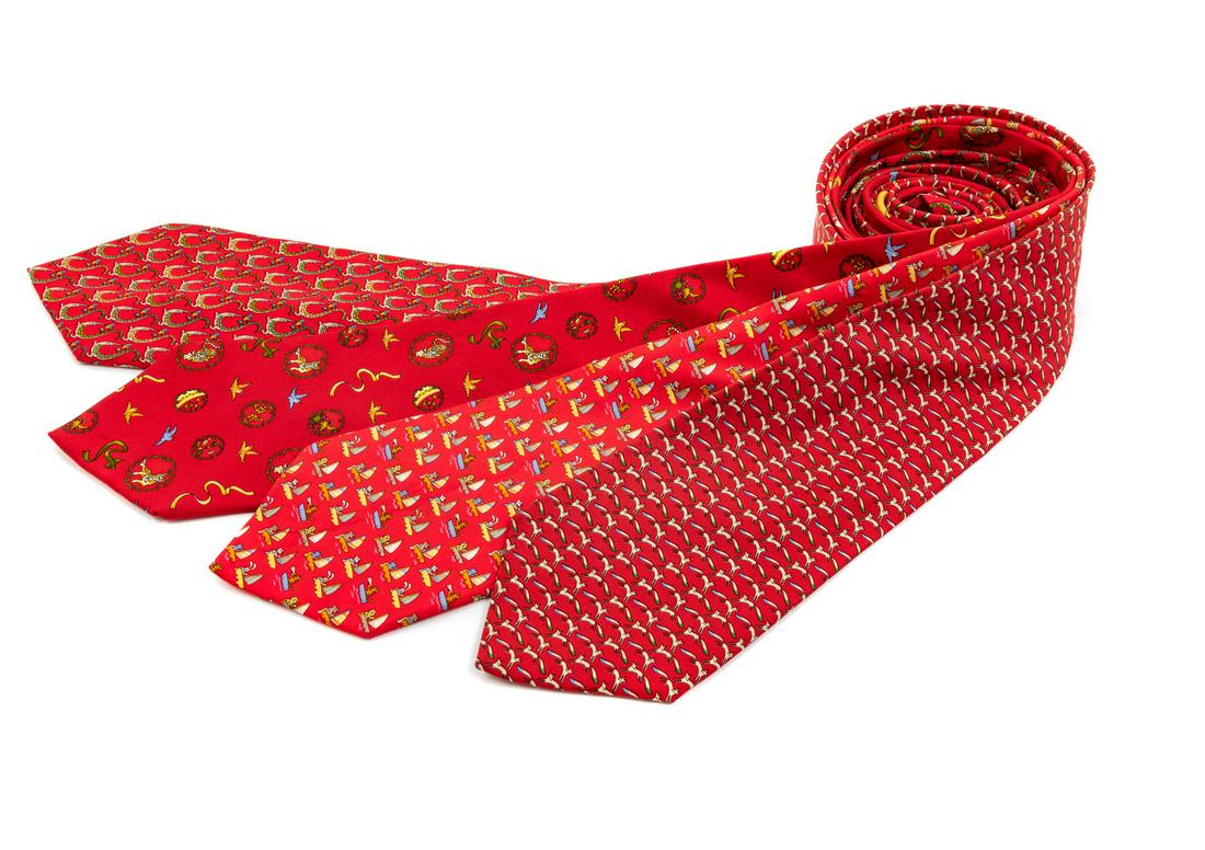 Four Salvatore Ferragamo Silk Ties,: Four Salvatore Ferragamo Silk Ties, the first; red with tiger, bird and ribbon motif, the second; red with crocodile and bird motif, the third; red with animals sailing motif, the fourth; red with fox