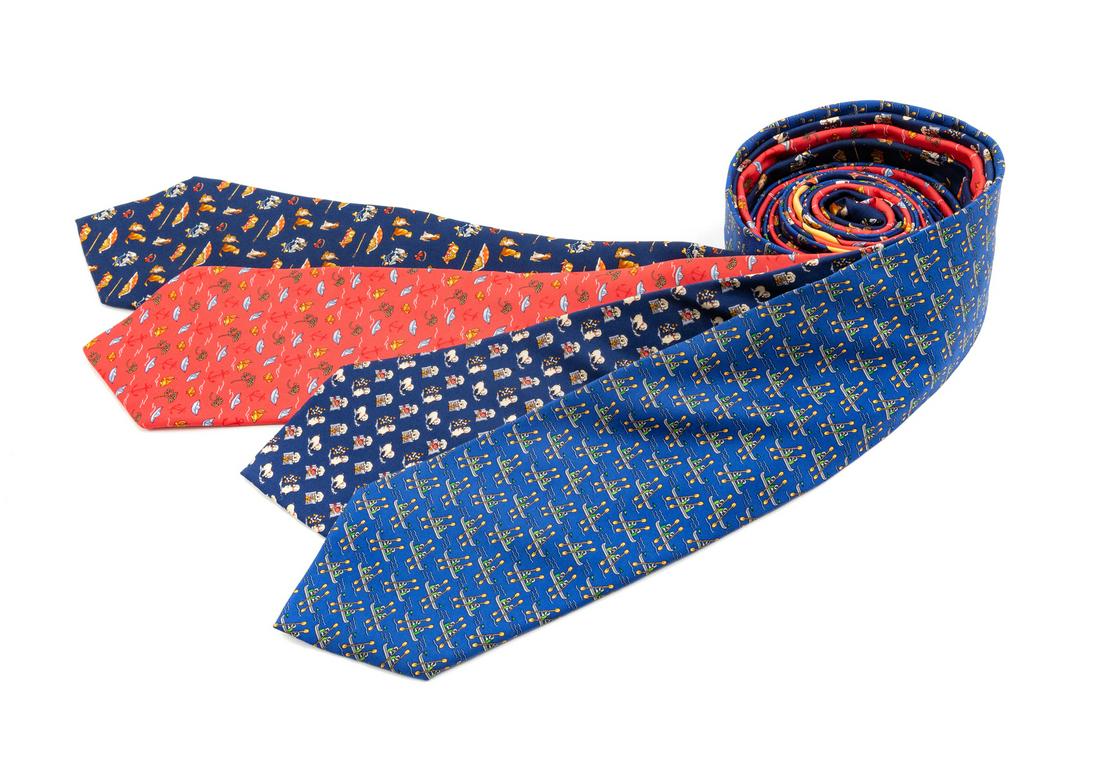 Four Salvatore Ferragamo Silk Ties,: Four Salvatore Ferragamo Silk Ties, the first: navy with dog motif, the second; blue with rowing motif, the third; coral with paper boat motif, the fourth; blue with dog with ones motif. Each Labeled: