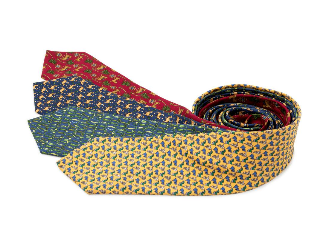 Four Salvatore Ferragamo Silk Ties, 1980-90s: Four Salvatore Ferragamo Silk Ties, 1980-90s The first; yellow with flag motif, the second; blue with pea pod motif, the third; burgundy with leopard and palm tree motif, the fourth; navy with camel m