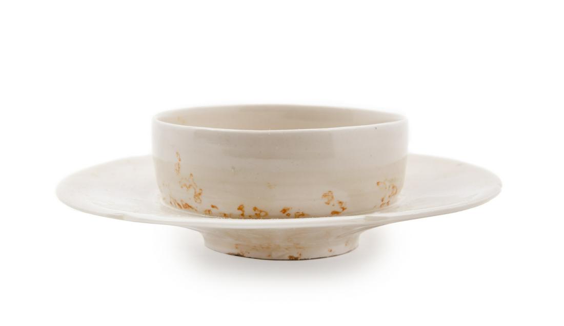 A Chinese Dingyao White Glazed Porcelain Cup and Stand (1 of 1)