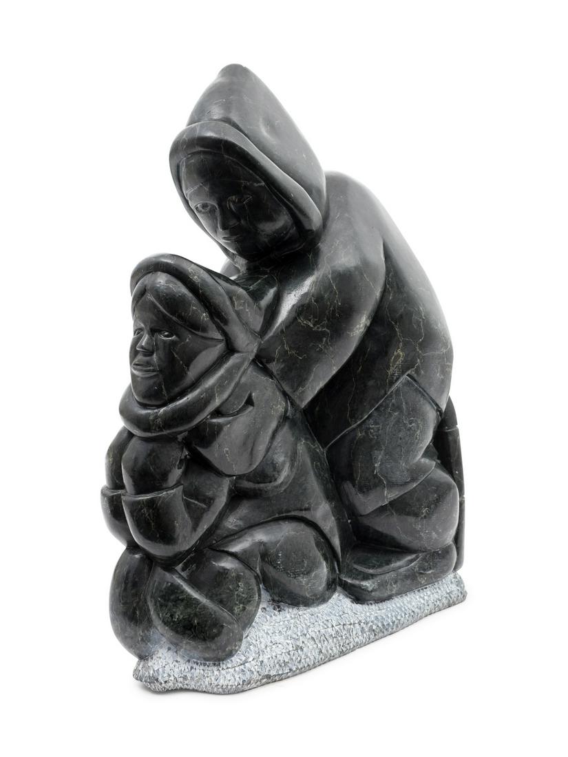 A Valwktwrwk Inuit Carved Stone Sculpture of a Woman (1 of 1)