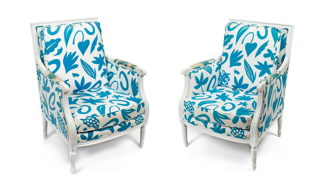 Three Louis XVI Style White Painted Bergeres Height 37: Three Louis XVI Style White Painted Bergeres 20TH CENTURY upholstered in contemporary blue and white fabric. Height 37 1/2 inches.