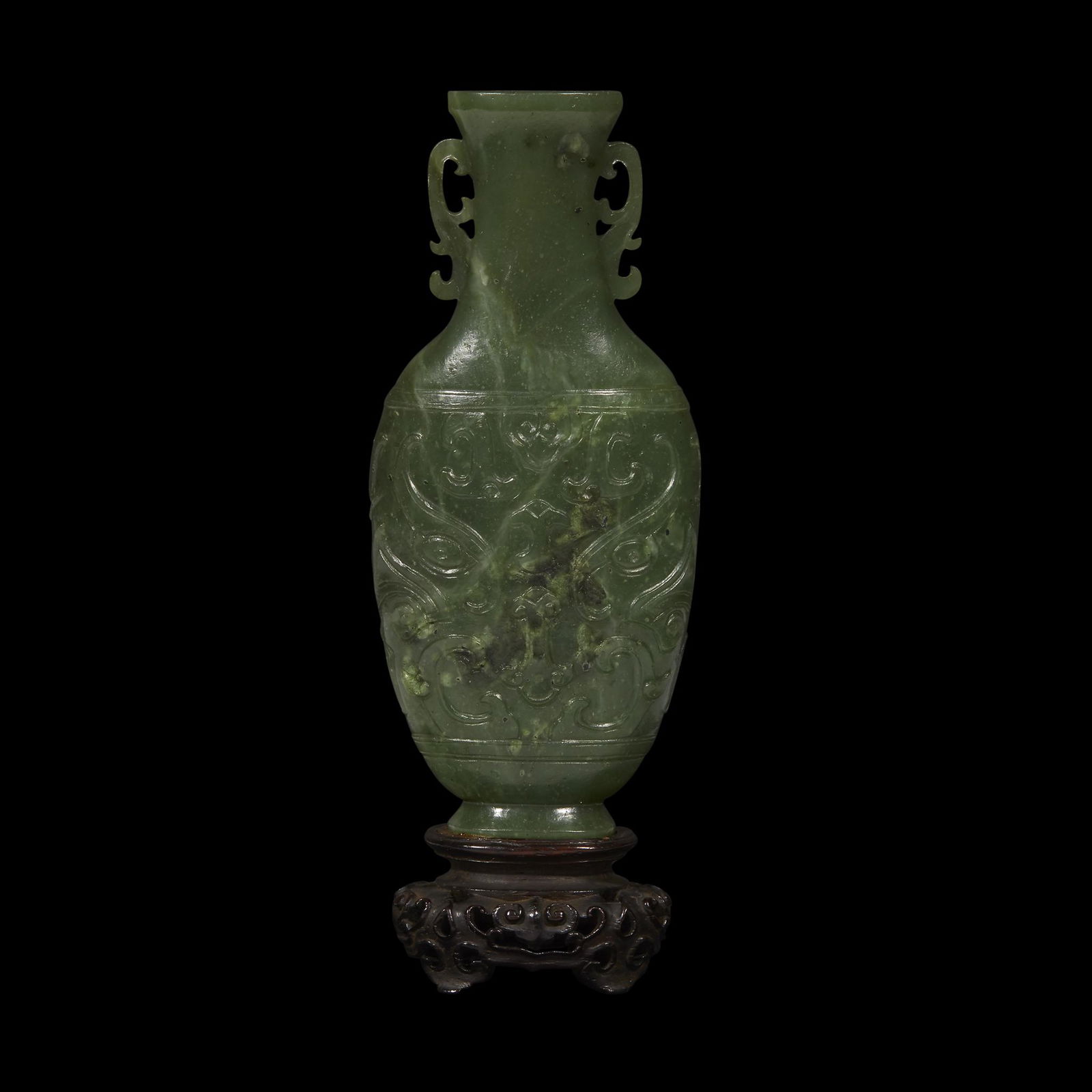 A Chinese carved spinach jade small archaistic vase, (1 of 2)