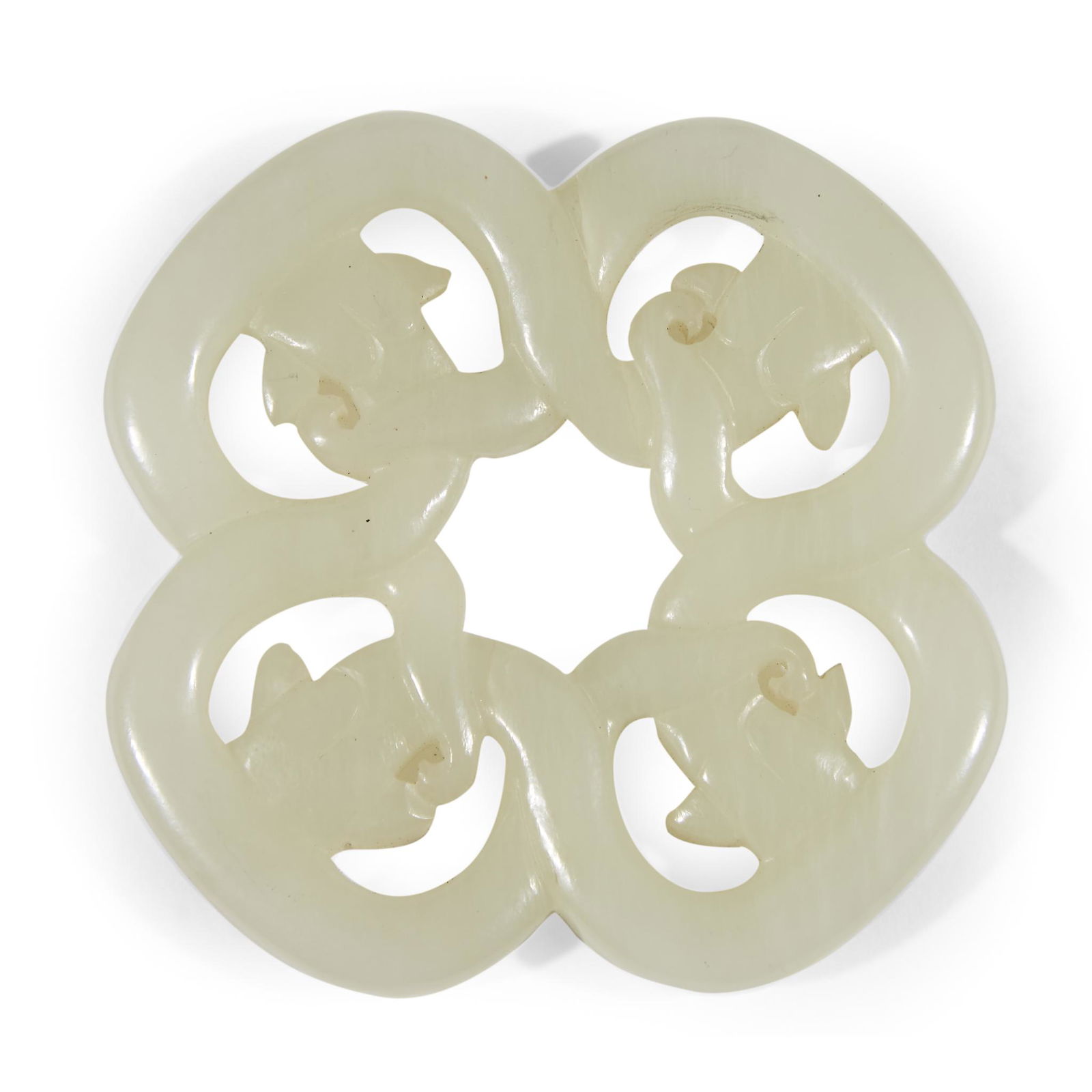 A Chinese carved celadon jade "Qilong" pendant, (1 of 2)