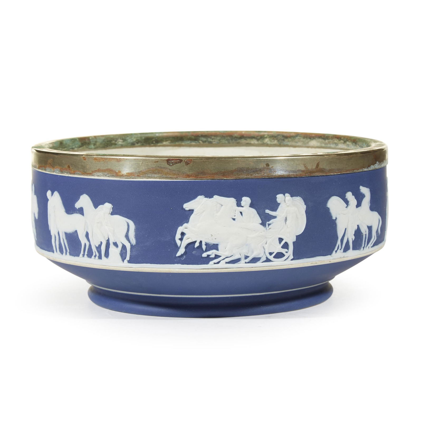 A Wedgwood 'Horses' center bowl with silver-plated rim,: A Wedgwood 'Horses' center bowl with silver-plated rim, late 19th century. The underside stamped "WEDGWOOD" and "ENGLAND" H: 4, Dia: 9 in. PROVENANCE: Seal Simons, Philadelphia, Pennsylvania Property