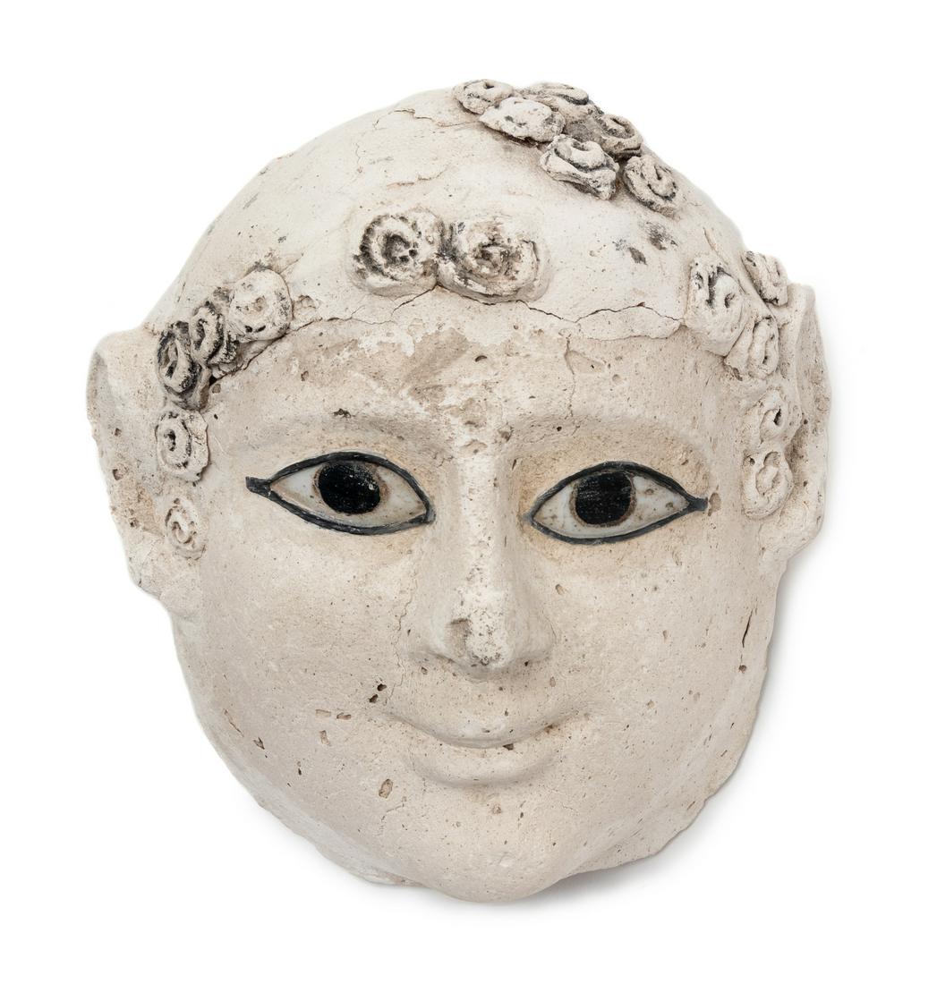 An Egyptian Stucco Funerary Mask of an Infant (1 of 1)