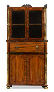 A Regency Rosewood Bookcase: A Regency Rosewood Bookcase Attributed to John McLean, Early 19th Century Height 64 1/4 x width 31 x depth 19 inches. Provenance: From the Estate of Oliver Wedgwood