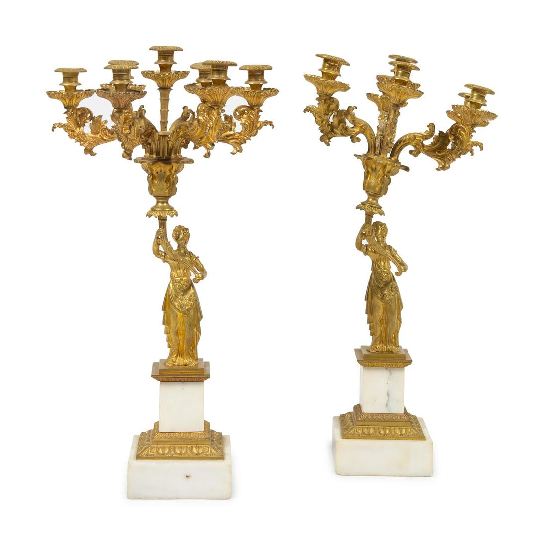 A Pair of Classical Gilt Bronze Seven-Light Candelabra: A Pair of Classical Gilt Bronze Seven-Light Candelabra Cornelius & Co., Philadelphia, 19th Century Height 27 inches. Property from the Collection of Michael and Janice Doniger, Chicago, Illinois Prove