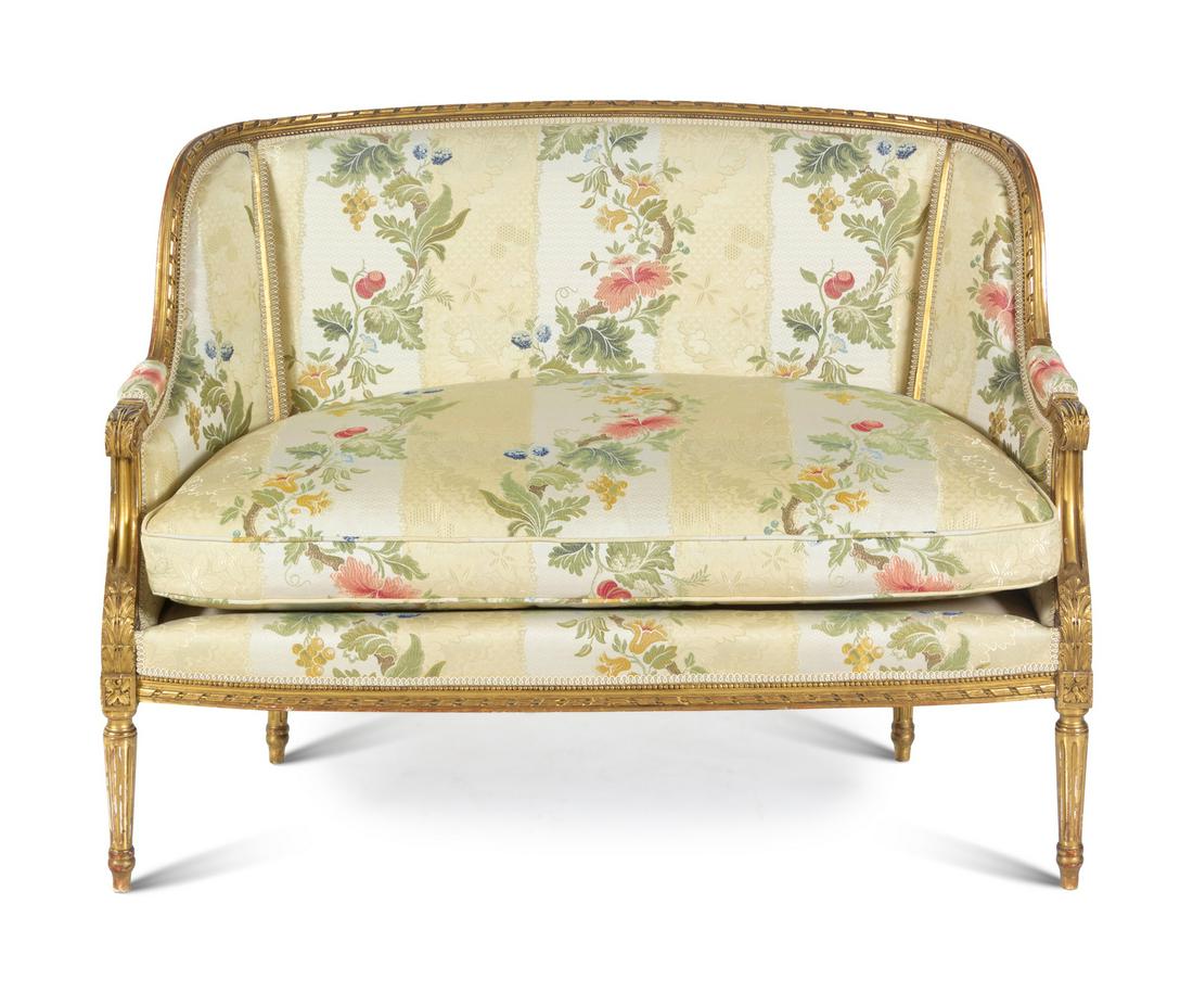A Louis XVI Style Giltwood Settee: A Louis XVI Style Giltwood Settee Late 19th/Early 20th Century with Scalamandre upholstery. Height 39 x width 51 1/2 x depth 18 3/4 inches.
