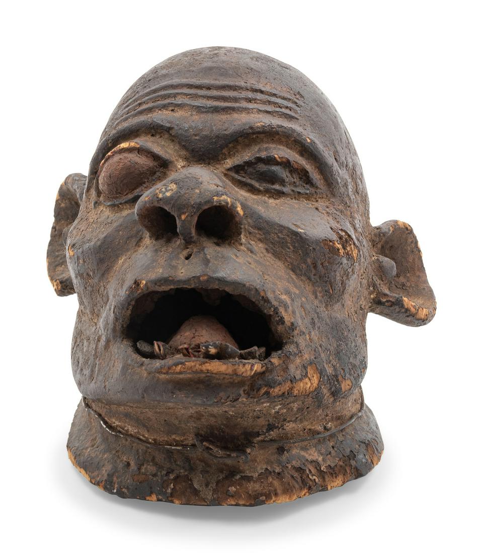 A Makonde Carved Wood Mask Height 14 inches. (1 of 2)