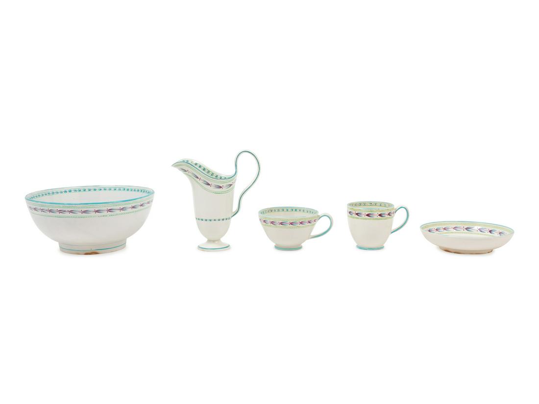 A Group of Wedgwood Pearlware Articles: A Group of Wedgwood Pearlware Articles Circa 1800 comprising a bowl, a creamer, two teacups of varying sizes and a saucer, all items except for the saucer with an impressed Wedgwood mark to the unders