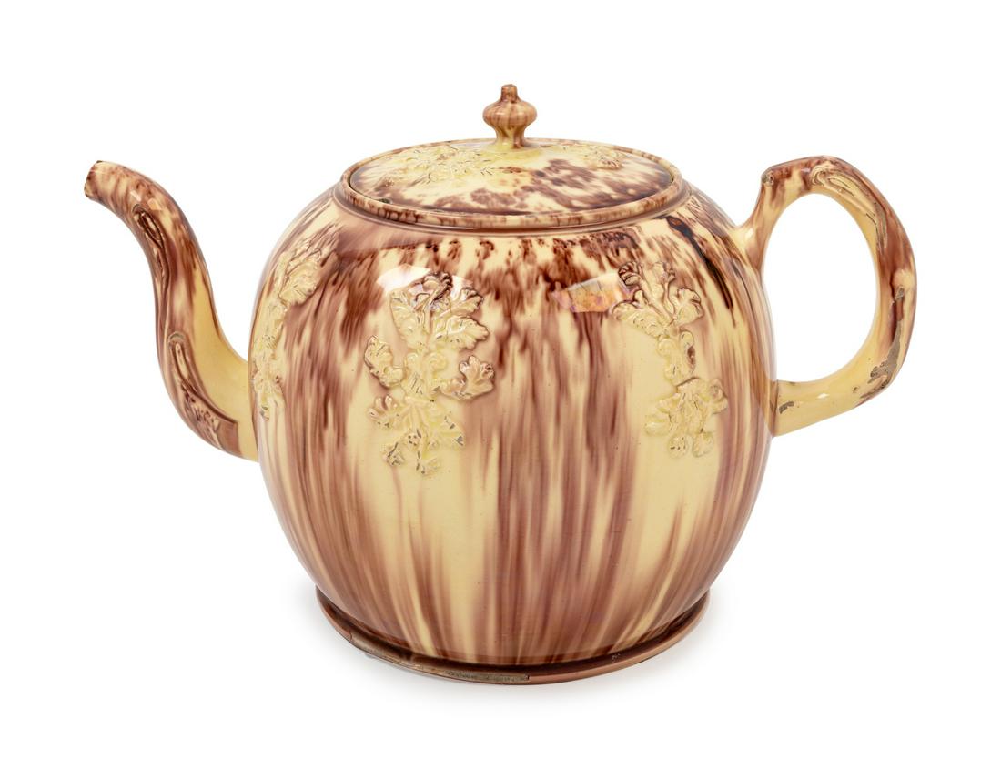 A Staffordshire Lead-Glazed Creamware Punch Pot: A Staffordshire Lead-Glazed Creamware Punch Pot Circa 1760 Height 9 x width 13 7/8 inches. Provenance: Property from the Art Institute of Chicago