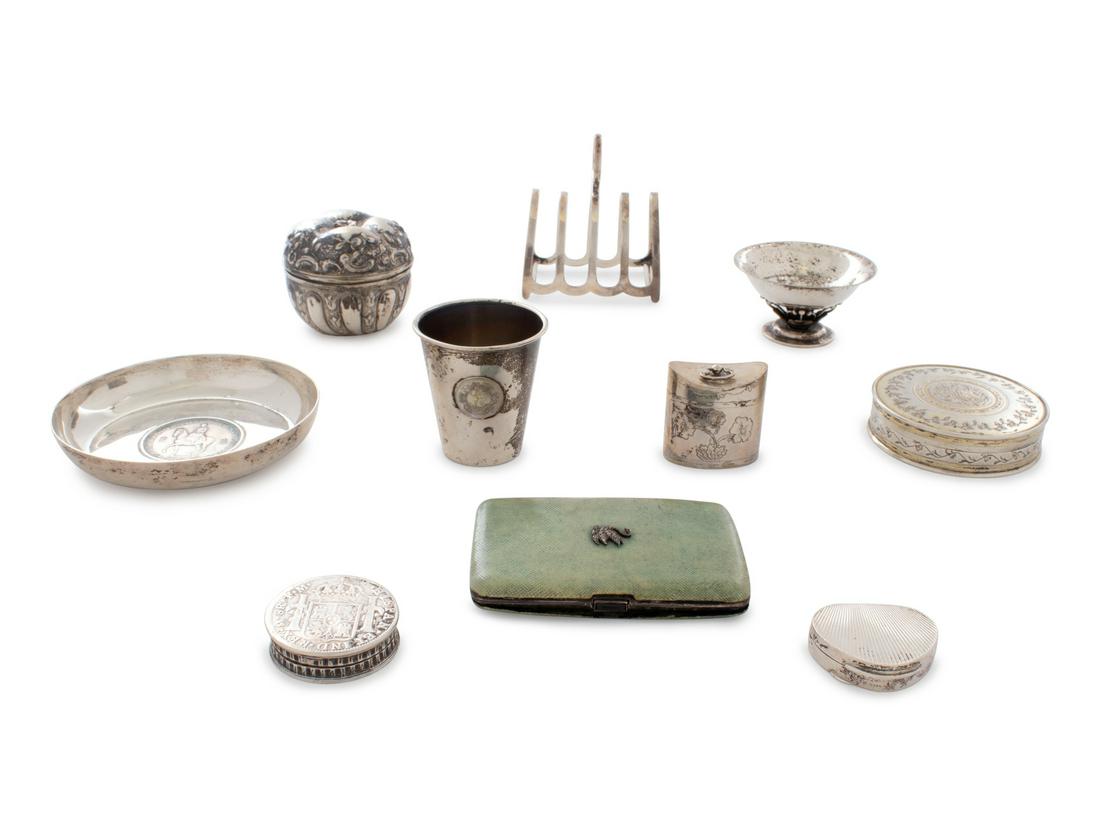A Collection of Silver Nutmeg Graters, Vesta Cases,: A Collection of Silver Nutmeg Graters, Vesta Cases, Snuff Boxes and Other Small Articles 19th Century and Later 48 items total having various hallmarks and purity stamps 62 ozt 1 dwt gross Width of la